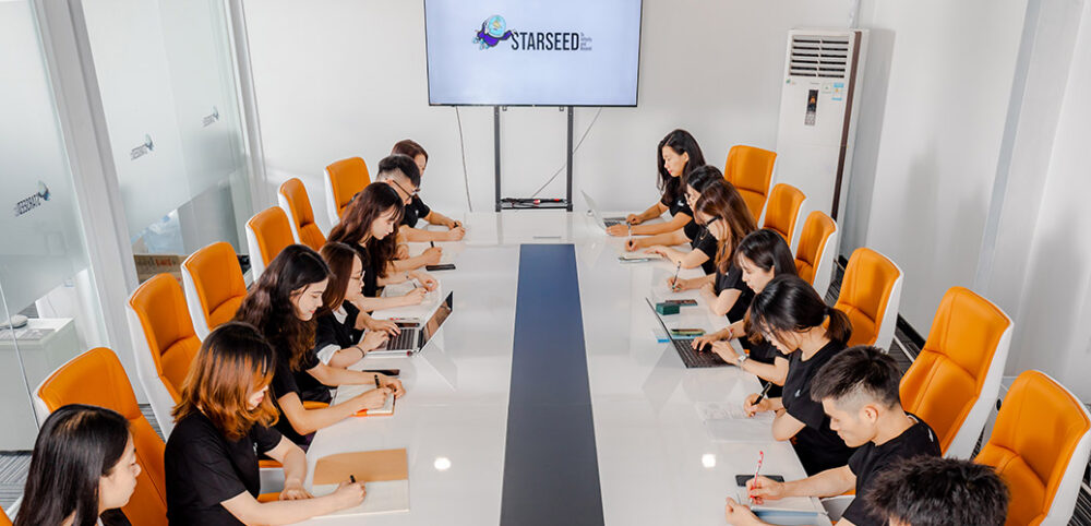 StarSeed member working in the meeting room
