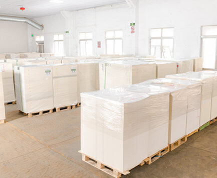 batches of paper stock in a warehouse